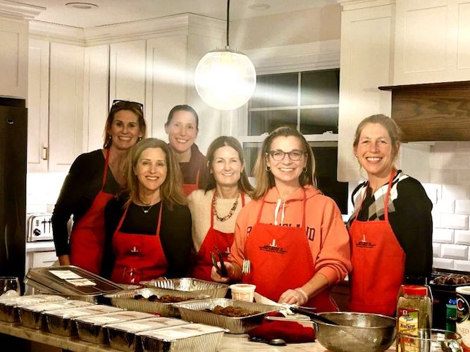 Junior League of Eastern Fairfield County Members Fill Pantry Freezers with Prepared Meals